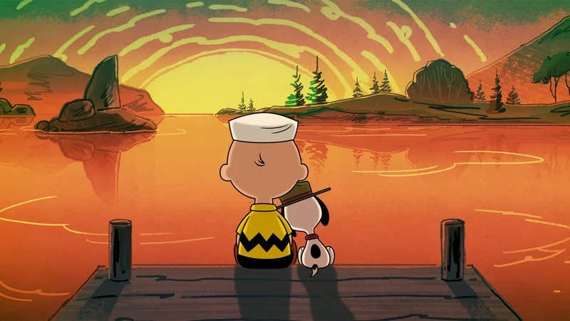 Charlie Brown and Snoopy sit together on a wooden dock, facing a glowing orange sunset over a calm lake, surrounded by trees and distant rocky hills.