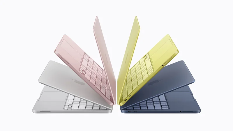 Four Apple MacBook Air laptops are displayed in various colors: silver, pink, yellow, and blue, arranged in a fan-like