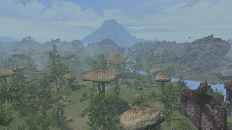 A landscape in the game The Elder Scrolls: Morrowind showcasing giant mushrooms, lush greenery, and distant mountains under a cloudy sky.