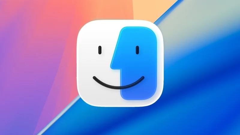Mac Finder app icon, a rounded white and blue square with a smiling two-tone face, centered on a soft gradient background of pink, orange, and blue diagonal streaks