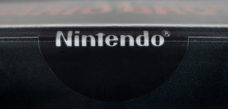 A closeup of the glossy sticker seal for Super Mario Bros.