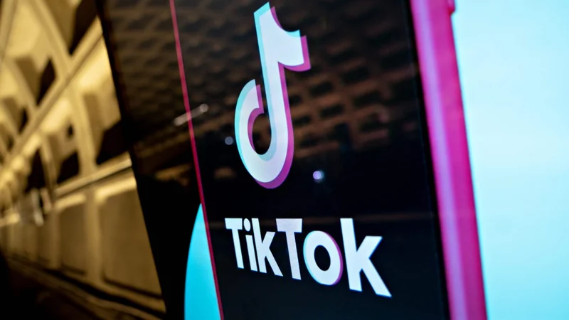 A large TikTok ad at a subway station.