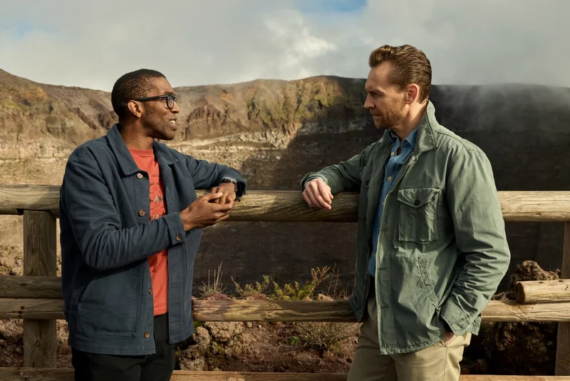 Chris Jackson and Tom Hiddleston discuss the events at Pompeii from atop Mt. Vesuvius.