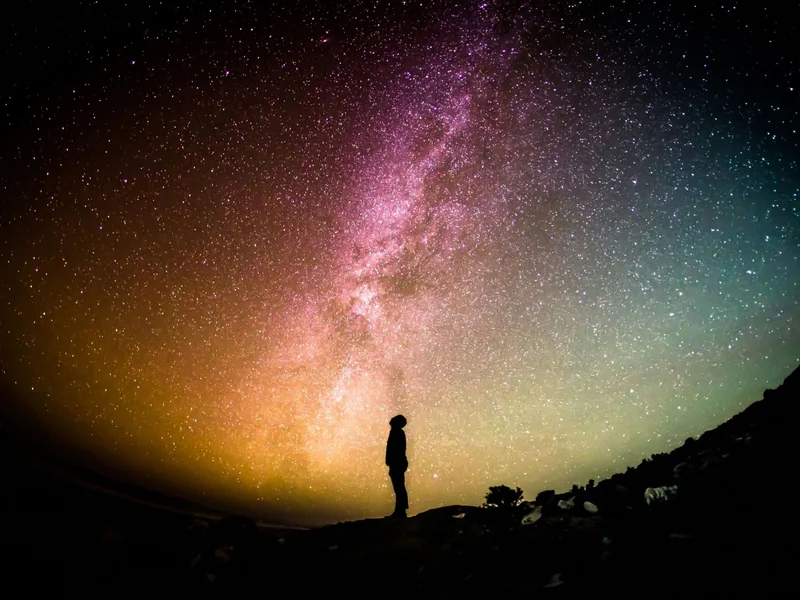 Person looking up at space as SenseTime has launched the Galaxy Project, teaming with nearly 20 partners to scale domestic AI chip infrastructure in China.