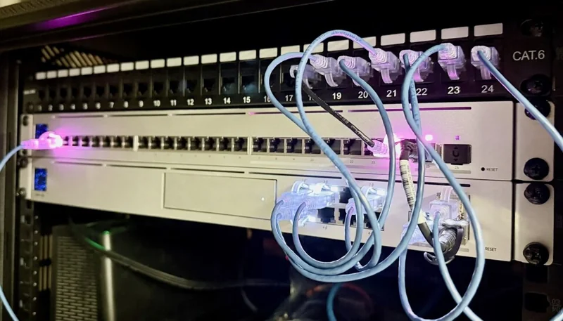 Ubiquiti's UDM-SE (the lower of the two silver boxes), isn't the most feature rich of SD-WAN gateways, but it doesn't require a license and it supports the two features I actually need, multi-WAN failover, load balancing and policy-based routing.