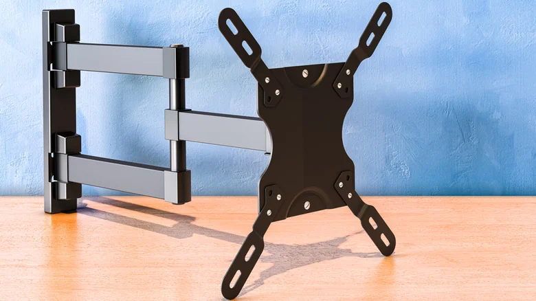 TV wall mount with adjustable arms and a VESA mounting plate.