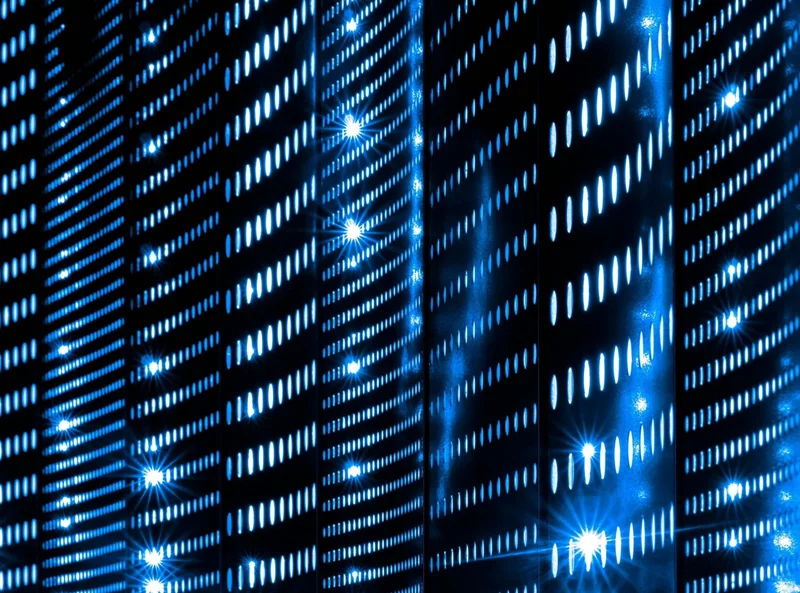 Abstract light evoking a data centre as Red Hat has launched asago, an open-source community project that aims to turn AI governance policy into production-ready deployment code.