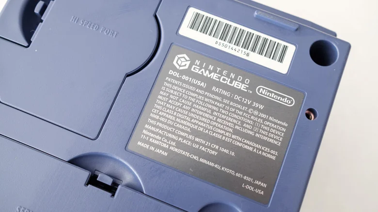 A closeup of the GameCube's back label, indicating the console is a DOL-001 model.