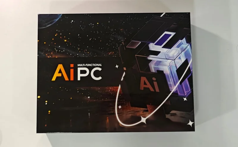 A product box with the text 'MULTI-FUNCTIONAL AiPC' on a space-themed background.