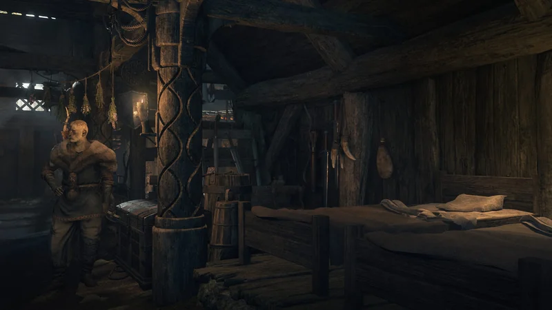 A scene from the video game 'Skyrim' shows a character standing inside a rustic wooden cabin with hanging herbs and a bed.
