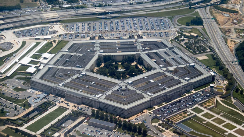 Aerial view of the Pentagon complex with surrounding roads, parking and greenery.
