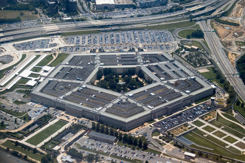 Aerial view of the Pentagon complex with surrounding roads, parking and greenery.