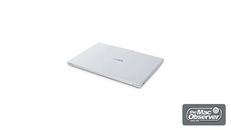 A closed Lenovo laptop with a light silver finish, featuring a logo on the lid.
