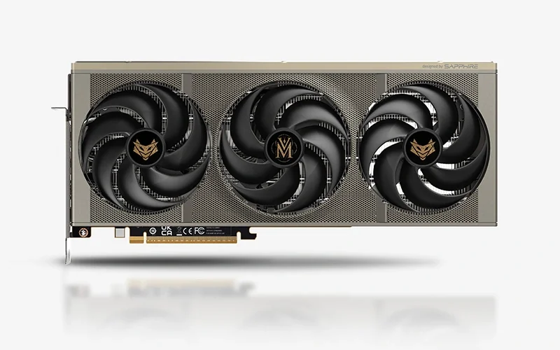 A Sapphire graphics card with triple fans and gold accents, featuring logos on each fan and a 'Designed by Sapphire' label on the edge.