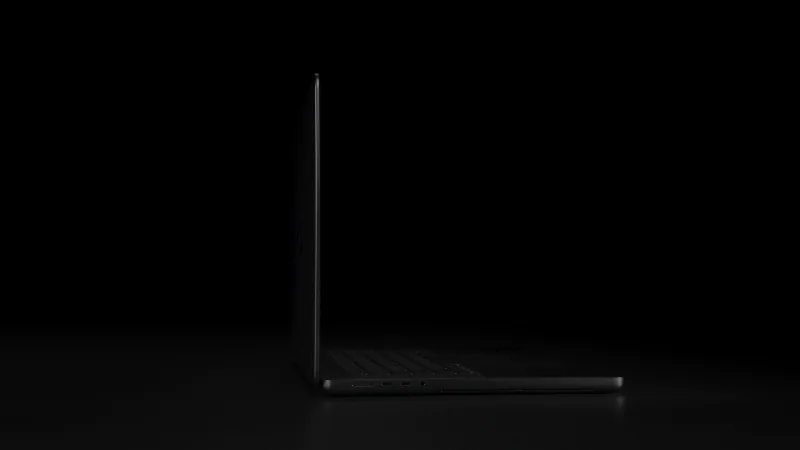 Apple MacBook Pro with light-up logo.